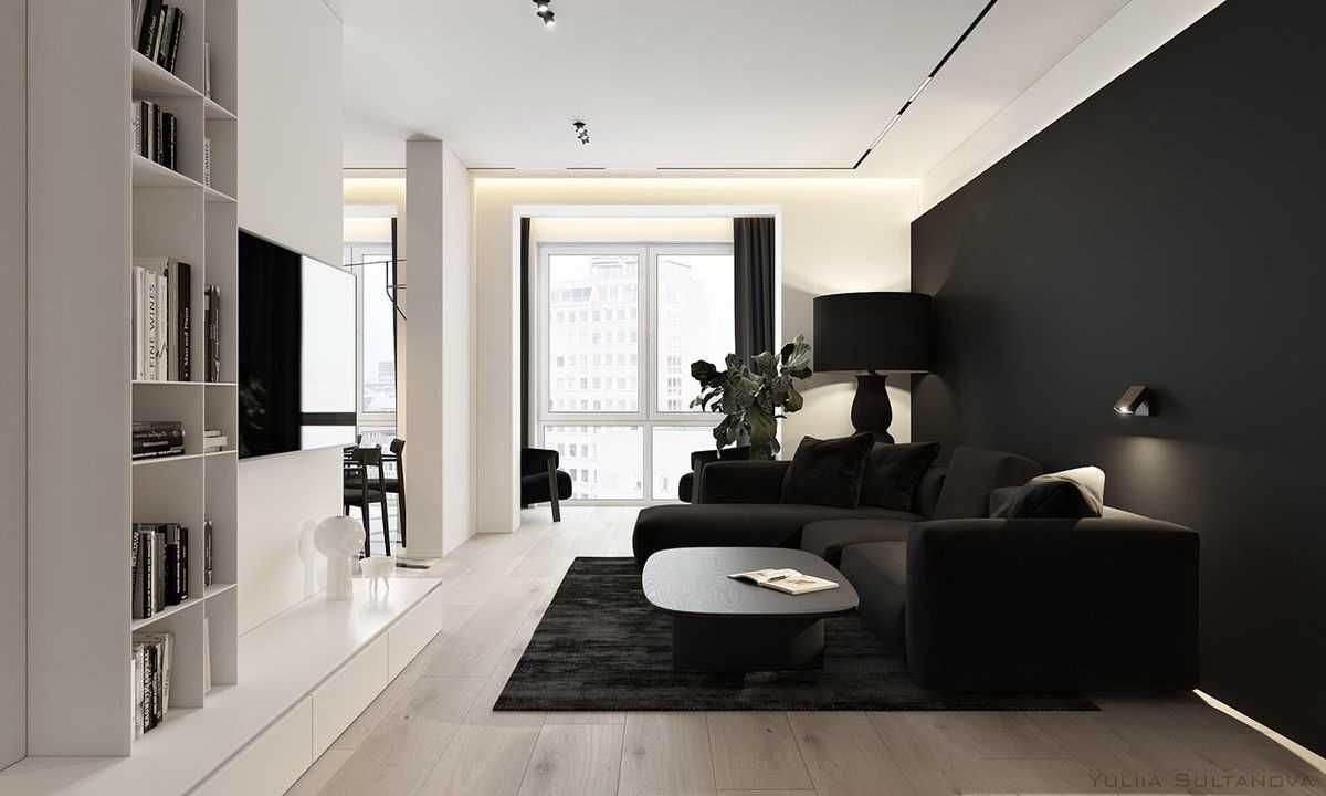 Чёрная зона дивана в белой гостиной, двухцветный интерьер
