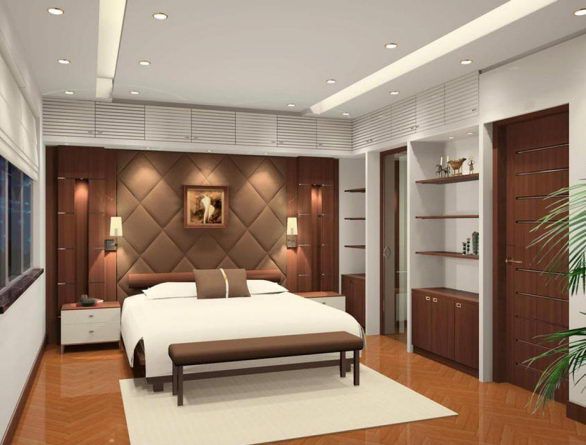 современная спальня с коричневыми мягкими стеновыми панелями за изголовьем кровати